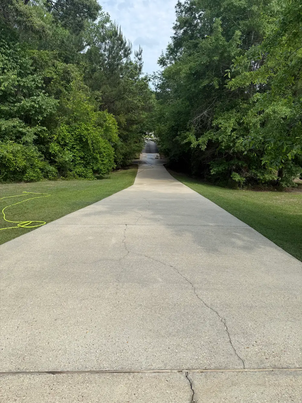 The same driveway fully cleaned