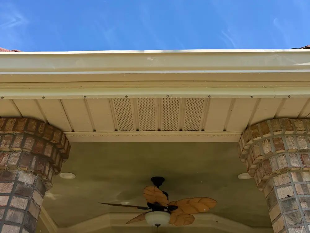 The same porch gutter bright and clean after washing